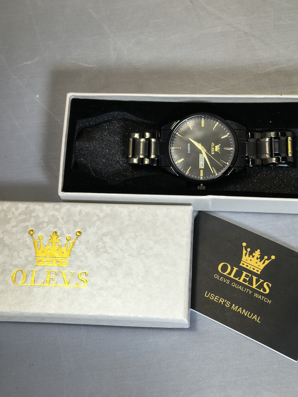 Men's Black Stainless Steel Watch with Gold Accents